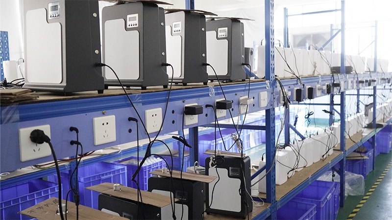 Aroma diffuser supplier AROMAPROX factory workshop with portable energy storage products undergoing pre-shipment power-on aging testing on shelves