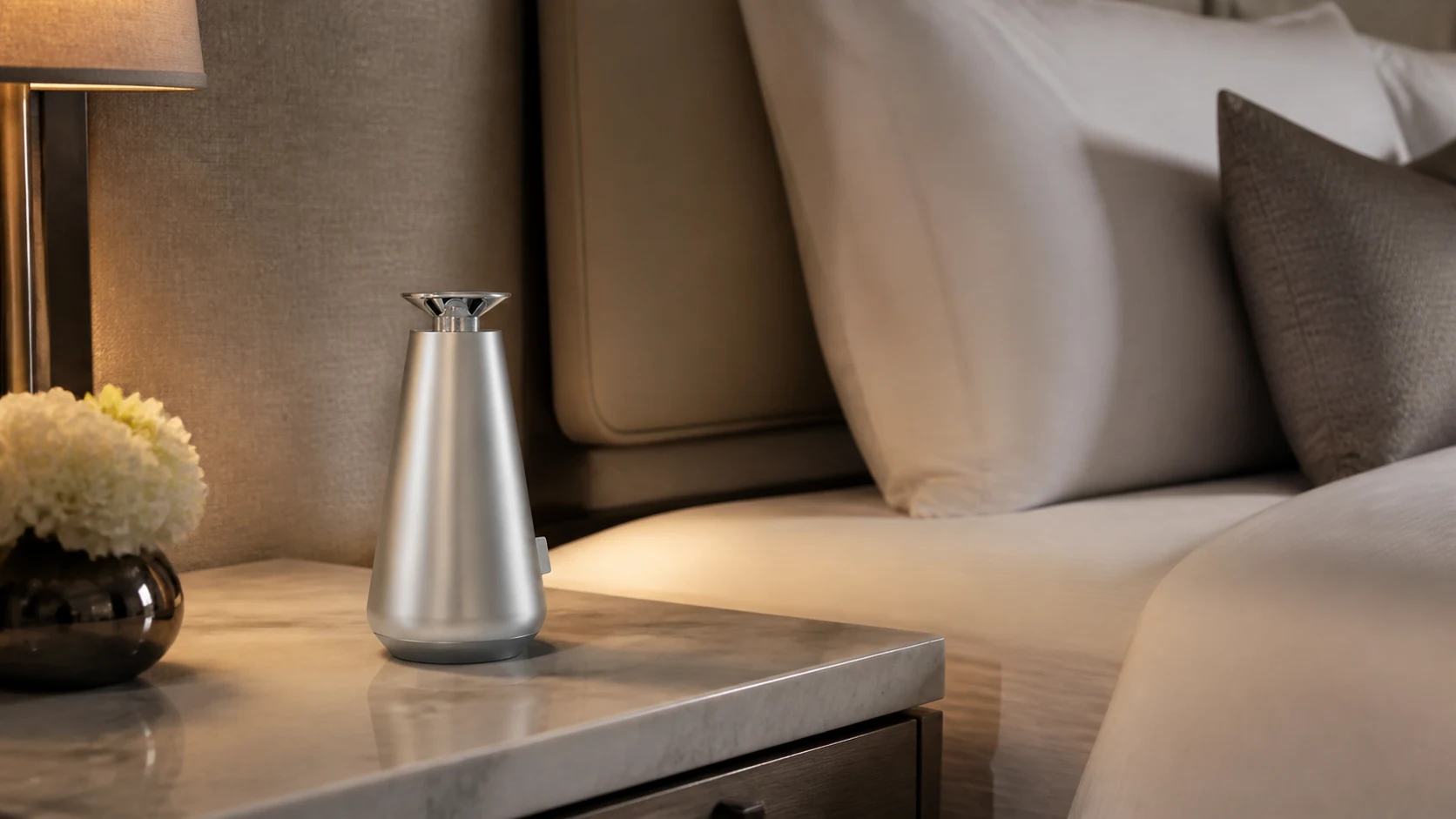 DecoPro scent diffuser on a hotel guestroom bedside table